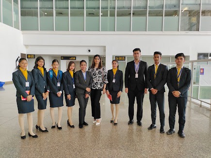 Students at airport visit